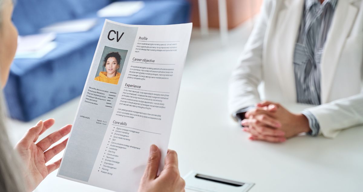 An employer reading a professionally written CV